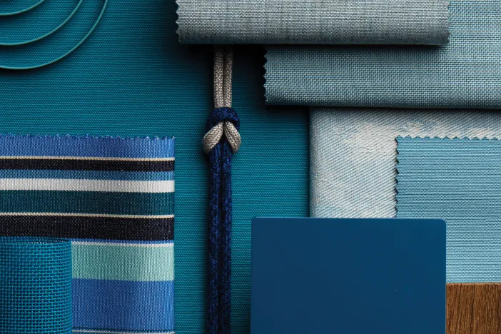 Outdoor fabric, frame and rope samples that complement a blue palette