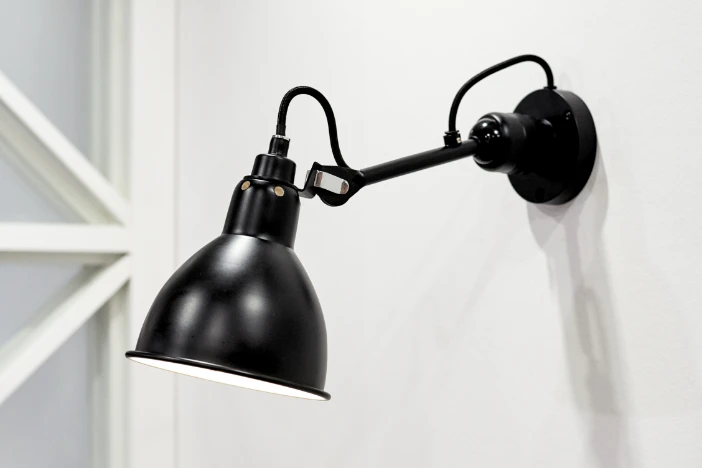 Adjustable black metal wall lamp