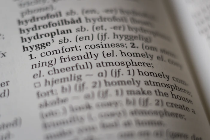 Close-up of a page in a dictionary listing for the word "hygge"