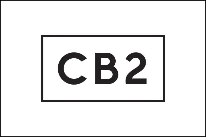 Black uppercase sans serif font CB2 logo in matching box on white background