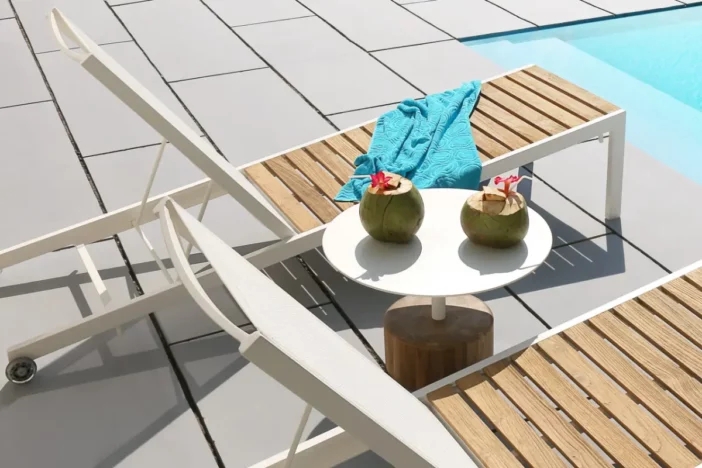 White Adirondack style sunloungers with adjustable backrests