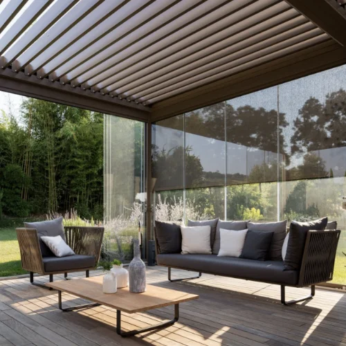 Smart pergola with louvered roof and adjustable wall screen shading a lounge set